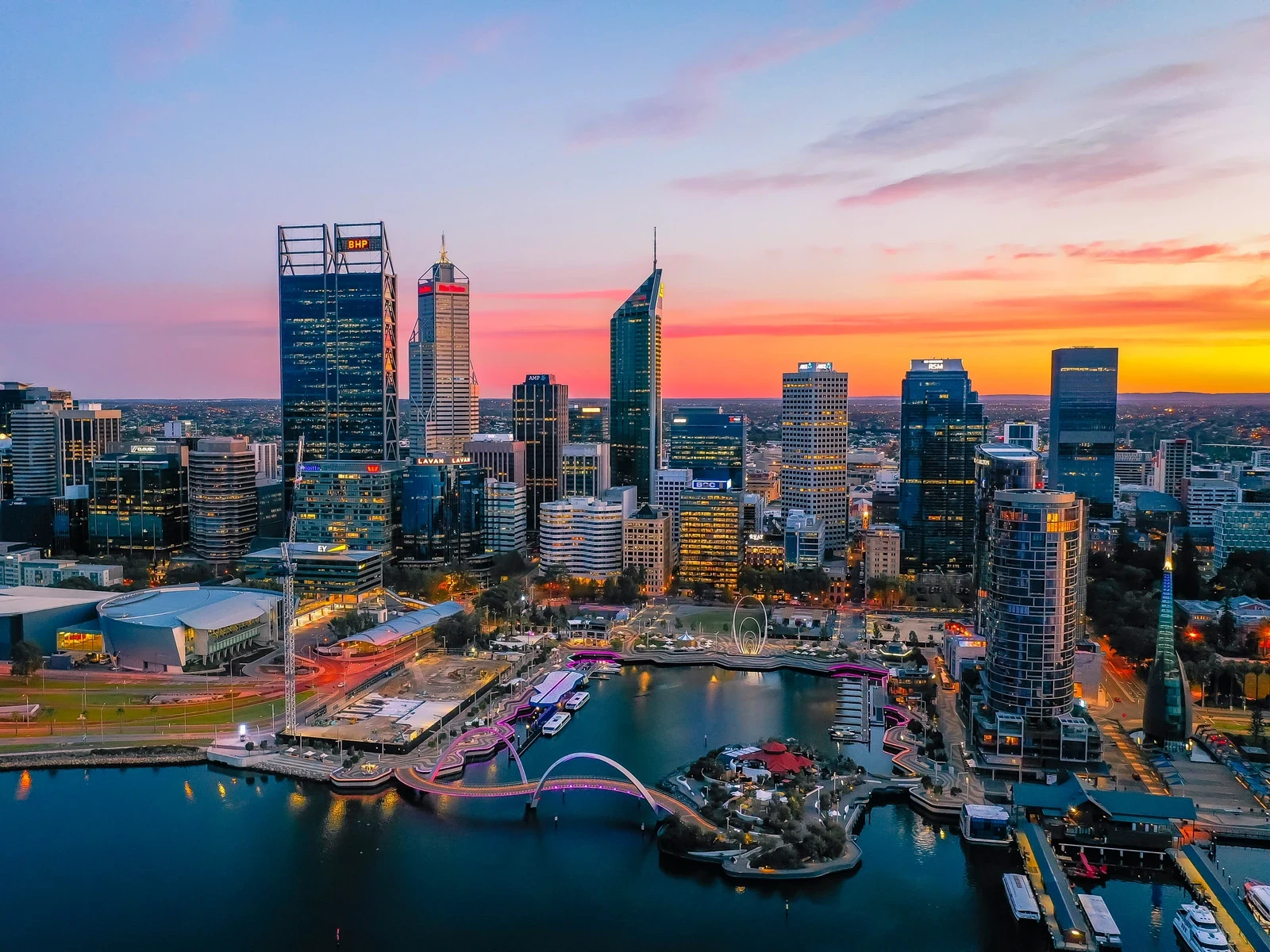 Perth city skyline at sunset over the water
